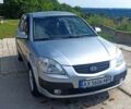 Серый Киа Рио, объемом двигателя 1.4 л и пробегом 214 тыс. км за 5600 $, фото 1 на Automoto.ua
