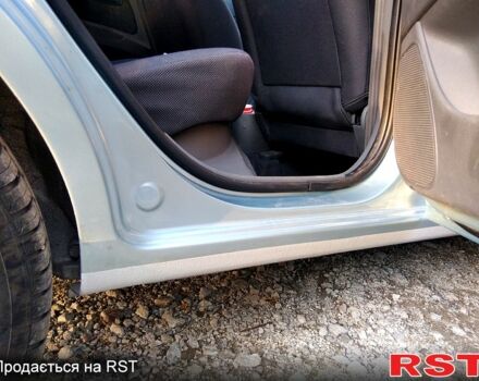 Серый Киа Рио, объемом двигателя 1.4 л и пробегом 225 тыс. км за 4500 $, фото 3 на Automoto.ua