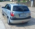 Серый Киа Рио, объемом двигателя 1.4 л и пробегом 214 тыс. км за 5600 $, фото 2 на Automoto.ua