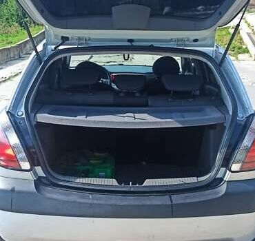Серый Киа Рио, объемом двигателя 1.4 л и пробегом 214 тыс. км за 5600 $, фото 3 на Automoto.ua