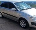 Серый Киа Рио, объемом двигателя 1.4 л и пробегом 214 тыс. км за 5600 $, фото 1 на Automoto.ua