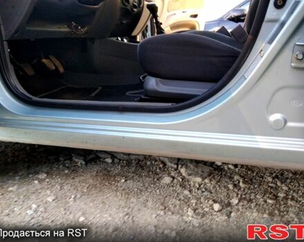 Серый Киа Рио, объемом двигателя 1.4 л и пробегом 225 тыс. км за 4500 $, фото 1 на Automoto.ua