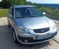 Серый Киа Рио, объемом двигателя 1.4 л и пробегом 214 тыс. км за 5600 $, фото 1 на Automoto.ua