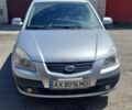 Серый Киа Рио, объемом двигателя 1.4 л и пробегом 205 тыс. км за 3900 $, фото 1 на Automoto.ua