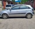 Серый Киа Рио, объемом двигателя 1.4 л и пробегом 205 тыс. км за 3950 $, фото 2 на Automoto.ua