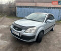 Серый Киа Рио, объемом двигателя 1.4 л и пробегом 223 тыс. км за 4700 $, фото 25 на Automoto.ua