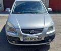Серый Киа Рио, объемом двигателя 1.4 л и пробегом 205 тыс. км за 3950 $, фото 1 на Automoto.ua
