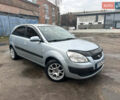 Серый Киа Рио, объемом двигателя 1.4 л и пробегом 223 тыс. км за 4700 $, фото 3 на Automoto.ua
