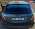 Серый Киа Рио, объемом двигателя 1.4 л и пробегом 357 тыс. км за 3800 $, фото 1 на Automoto.ua