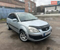 Серый Киа Рио, объемом двигателя 1.4 л и пробегом 223 тыс. км за 4700 $, фото 2 на Automoto.ua
