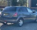 Серый Киа Рио, объемом двигателя 1.4 л и пробегом 149 тыс. км за 4999 $, фото 5 на Automoto.ua