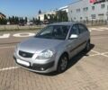 Серый Киа Рио, объемом двигателя 1.4 л и пробегом 87 тыс. км за 6800 $, фото 2 на Automoto.ua