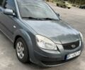 Сірий Кіа Ріо, об'ємом двигуна 1.4 л та пробігом 255 тис. км за 3897 $, фото 1 на Automoto.ua