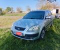 Серый Киа Рио, объемом двигателя 1.4 л и пробегом 225 тыс. км за 3800 $, фото 1 на Automoto.ua