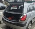 Серый Киа Рио, объемом двигателя 1.4 л и пробегом 130 тыс. км за 4500 $, фото 3 на Automoto.ua