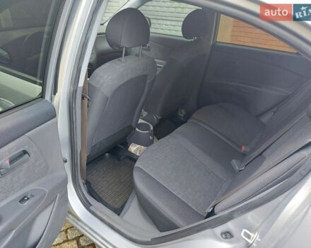 Серый Киа Рио, объемом двигателя 1.4 л и пробегом 33 тыс. км за 5500 $, фото 2 на Automoto.ua