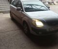 Серый Киа Рио, объемом двигателя 1.4 л и пробегом 220 тыс. км за 4200 $, фото 1 на Automoto.ua
