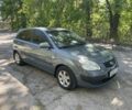 Серый Киа Рио, объемом двигателя 1.4 л и пробегом 253 тыс. км за 4300 $, фото 4 на Automoto.ua