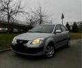 Серый Киа Рио, объемом двигателя 1.4 л и пробегом 256 тыс. км за 3800 $, фото 1 на Automoto.ua