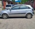 Серый Киа Рио, объемом двигателя 1.4 л и пробегом 205 тыс. км за 3900 $, фото 1 на Automoto.ua