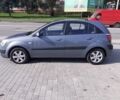 Серый Киа Рио, объемом двигателя 1.6 л и пробегом 209 тыс. км за 6490 $, фото 2 на Automoto.ua