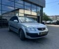 Серый Киа Рио, объемом двигателя 1.4 л и пробегом 135 тыс. км за 5778 $, фото 1 на Automoto.ua