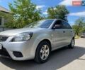 Серый Киа Рио, объемом двигателя 1.4 л и пробегом 223 тыс. км за 4250 $, фото 1 на Automoto.ua
