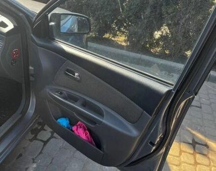 Серый Киа Рио, объемом двигателя 1.4 л и пробегом 221 тыс. км за 3500 $, фото 8 на Automoto.ua