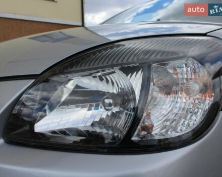 Сірий Кіа Ріо, об'ємом двигуна 1.4 л та пробігом 165 тис. км за 5590 $, фото 25 на Automoto.ua