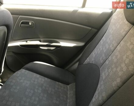 Серый Киа Рио, объемом двигателя 1.4 л и пробегом 95 тыс. км за 2880 $, фото 6 на Automoto.ua