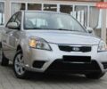Сірий Кіа Ріо, об'ємом двигуна 1.4 л та пробігом 165 тис. км за 5590 $, фото 2 на Automoto.ua