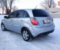 Серый Киа Рио, объемом двигателя 1.4 л и пробегом 240 тыс. км за 4500 $, фото 4 на Automoto.ua