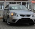 Сірий Кіа Ріо, об'ємом двигуна 1.4 л та пробігом 165 тис. км за 5590 $, фото 3 на Automoto.ua
