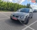 Сірий Кіа Ріо, об'ємом двигуна 1.6 л та пробігом 207 тис. км за 6490 $, фото 1 на Automoto.ua