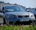 Сірий Кіа Ріо, об'ємом двигуна 1.4 л та пробігом 213 тис. км за 4999 $, фото 2 на Automoto.ua