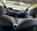 Сірий Кіа Ріо, об'ємом двигуна 1.4 л та пробігом 210 тис. км за 5200 $, фото 4 на Automoto.ua