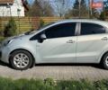 Серый Киа Рио, объемом двигателя 1.12 л и пробегом 220 тыс. км за 5700 $, фото 1 на Automoto.ua
