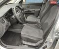 Сірий Кіа Ріо, об'ємом двигуна 1.4 л та пробігом 182 тис. км за 5850 $, фото 5 на Automoto.ua