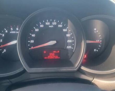 Серый Киа Рио, объемом двигателя 1.12 л и пробегом 208 тыс. км за 6600 $, фото 4 на Automoto.ua