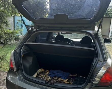 Сірий Кіа Ріо, об'ємом двигуна 1.4 л та пробігом 210 тис. км за 2999 $, фото 3 на Automoto.ua