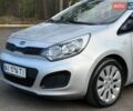 Серый Киа Рио, объемом двигателя 1.4 л и пробегом 103 тыс. км за 8000 $, фото 1 на Automoto.ua