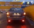 Сірий Кіа Ріо, об'ємом двигуна 1.4 л та пробігом 103 тис. км за 5800 $, фото 4 на Automoto.ua