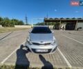 Серый Киа Рио, объемом двигателя 1.4 л и пробегом 254 тыс. км за 6500 $, фото 1 на Automoto.ua