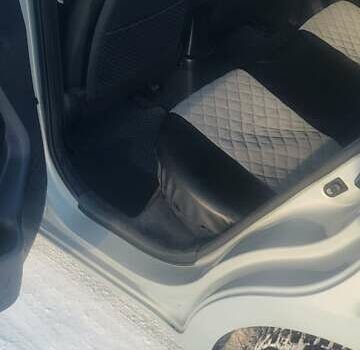 Серый Киа Рио, объемом двигателя 1.12 л и пробегом 208 тыс. км за 6600 $, фото 2 на Automoto.ua