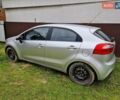 Серый Киа Рио, объемом двигателя 1.12 л и пробегом 260 тыс. км за 5500 $, фото 1 на Automoto.ua