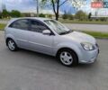 Серый Киа Рио, объемом двигателя 1.4 л и пробегом 201 тыс. км за 6200 $, фото 1 на Automoto.ua