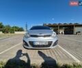 Серый Киа Рио, объемом двигателя 1.4 л и пробегом 254 тыс. км за 6500 $, фото 1 на Automoto.ua