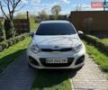 Серый Киа Рио, объемом двигателя 1.12 л и пробегом 220 тыс. км за 6700 $, фото 1 на Automoto.ua
