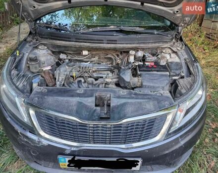 Серый Киа Рио, объемом двигателя 1.4 л и пробегом 205 тыс. км за 5400 $, фото 2 на Automoto.ua