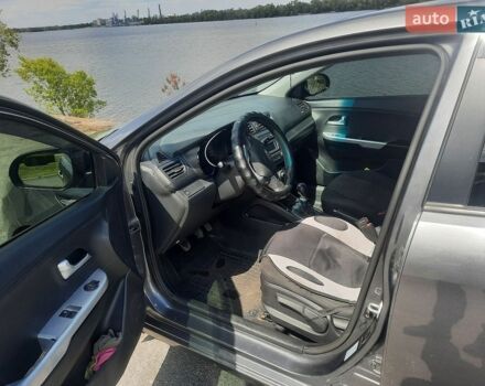 Серый Киа Рио, объемом двигателя 1.4 л и пробегом 198 тыс. км за 6700 $, фото 9 на Automoto.ua